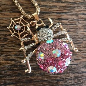 Ombré pink crystal spider necklace.